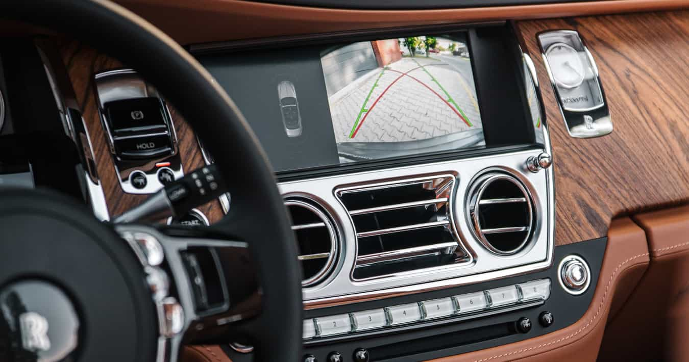 Car dashboard with backup camera